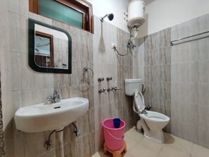 Shower, rainfall showerhead, towels, soap