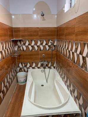 Triple Room, Garden View | Bathroom | Combined shower/tub, free toiletries, slippers, bidet - Devchuli Farm House (Kawasoti)