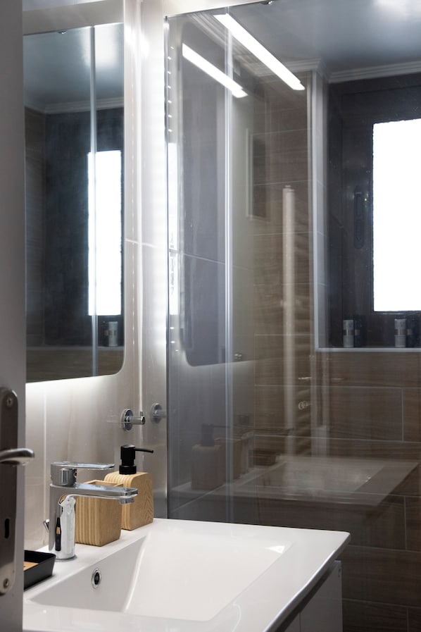 Hair dryer, towels, soap, toilet paper