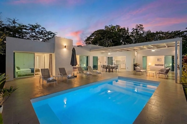 Golden hour at Villa Clara. Watch the sky transform over the stunning pool.