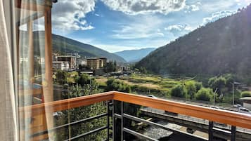 Deluxe Double or Twin Room, Balcony, City View | In-room safe, desk, laptop workspace, blackout curtains