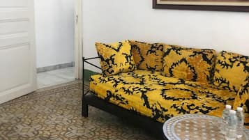 Room Adam | Living area | 40-inch plasma TV with digital channels