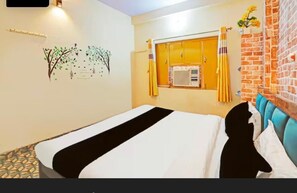 Quarto casal luxo, vista para a cidade | Wi-Fi de cortesia, roupa de cama