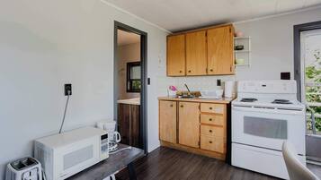 Fridge, microwave, stovetop, cookware/dishes/utensils