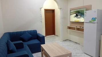 Family Double Room | Living area