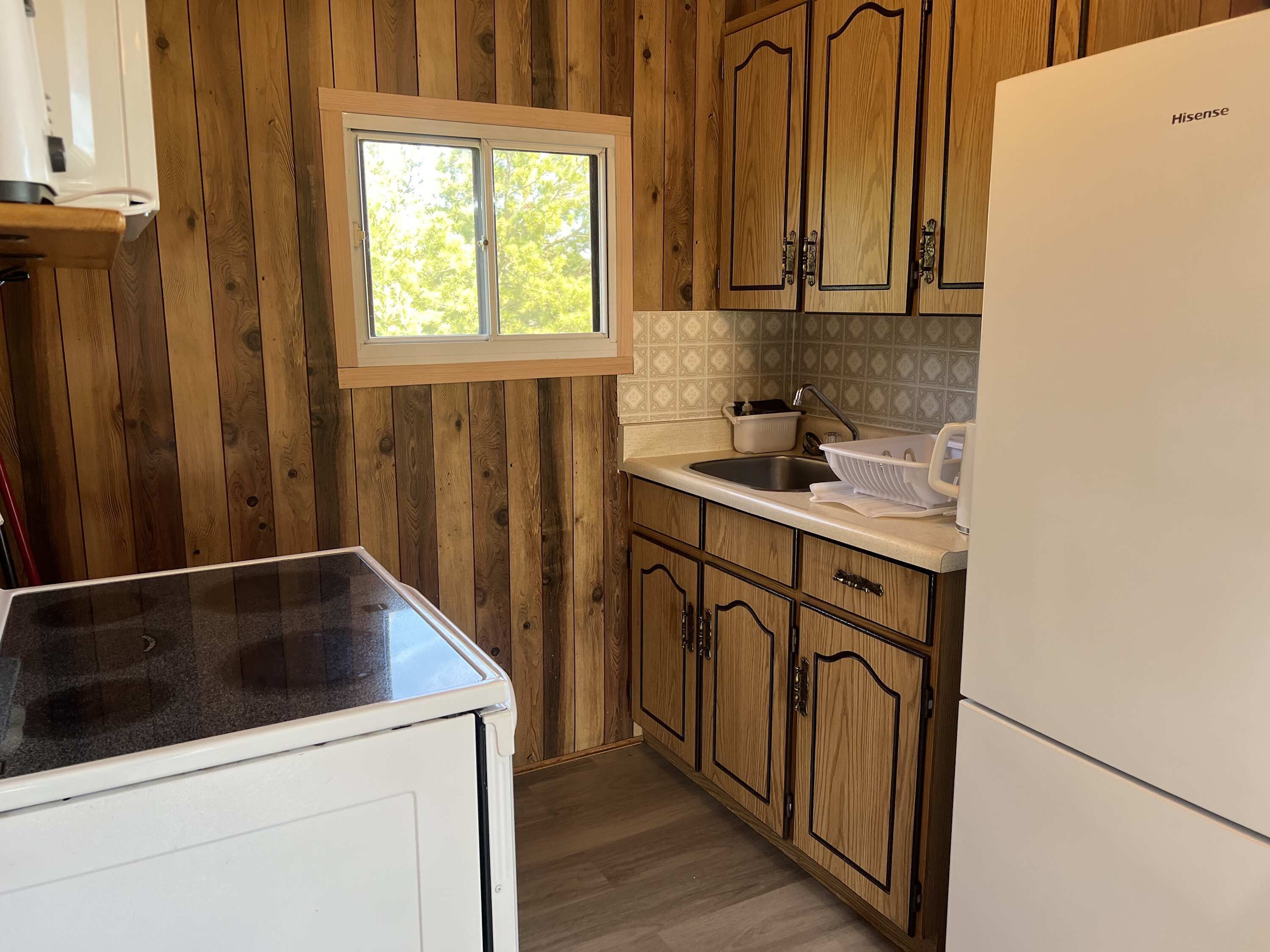 Fridge, microwave, stovetop, cookware/dishes/utensils