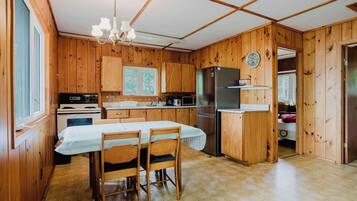 Fridge, microwave, stovetop, cookware/dishes/utensils