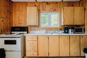 Fridge, microwave, stovetop, cookware/dishes/utensils