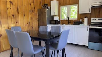 Fridge, microwave, stovetop, cookware/dishes/utensils