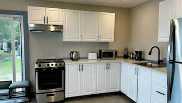 Fridge, microwave, stovetop, cookware/dishes/utensils