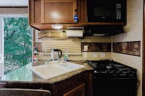 Fridge, microwave, stovetop, cookware/dishes/utensils