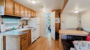 Fridge, microwave, stovetop, cookware/dishes/utensils