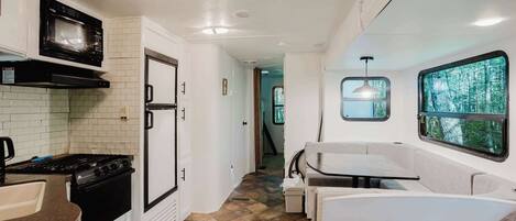 Fridge, microwave, stovetop, cookware/dishes/utensils