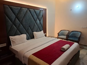 Quarto superior, vista para a cidade | Wi-Fi de cortesia, roupa de cama