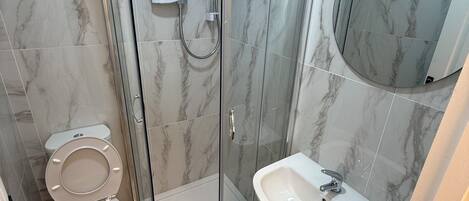 Hair dryer, towels, soap, toilet paper