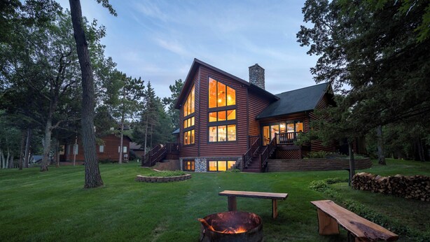 A log cabin with a fire pit, picnic table, and a well-maintained lawn. - Moose Lodge/ Firepit/ Swim/ Pontoon/ Kayaks (Pequot Lakes)