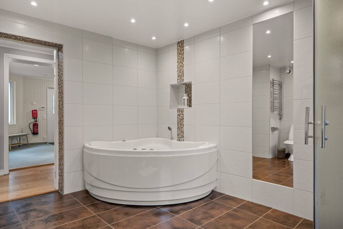 Shower, hair dryer, towels, toilet paper