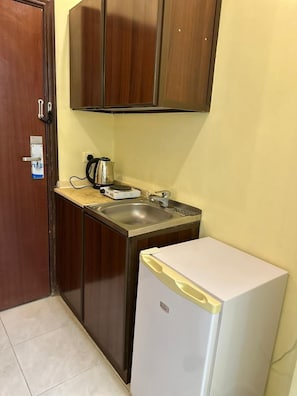 Quarto duplo | Cozinha privada | Frigobar, cooktop