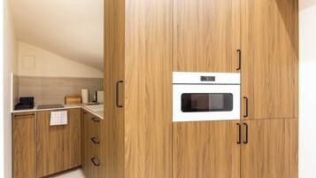 Apartment | Private kitchen | Fridge, microwave, stovetop, dishwasher