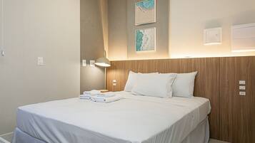 Ferros/tábuas de passar roupa, acesso à internet, roupa de cama