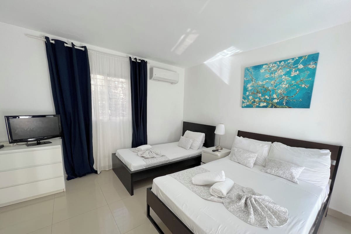 Family Studio, Balcony, Pool View | In-room safe, iron/ironing board, free WiFi, bed sheets