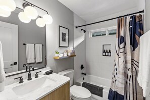 Hair dryer, towels, soap, shampoo