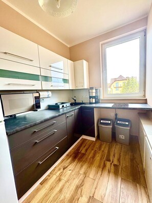 Appartement | Privékeuken | Een kinderstoel