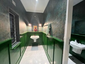 Shower, towels, soap, toilet paper