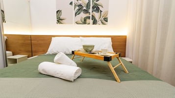 Apartamento conforto | Camas Select Comfort, escrivaninha, quartos à prova de som