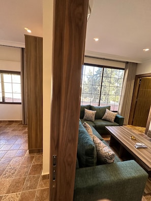 Apartment, 1 Bedroom, Accessible, Smoking | Living area | Flat-screen TV - 12 Antica Jabal Al Lweibdeh (Amman)