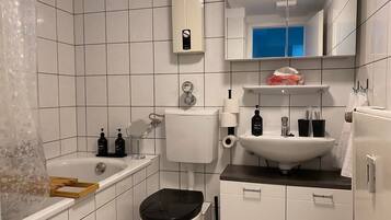 Hair dryer, towels, soap, toilet paper