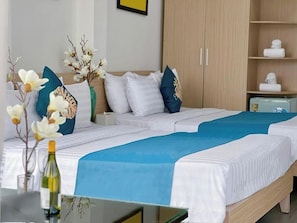Standard Triple Room, City View | Iron/ironing board, free WiFi