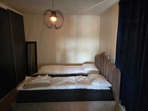 2 slaapkamers, een kluis op de kamer, een strijkplank/strijkijzer