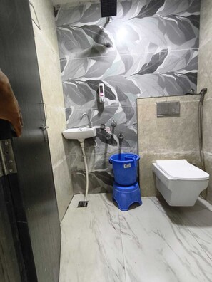 Deluxe tweepersoonskamer | Badkamer | Gratis toiletartikelen, handdoeken, zeep