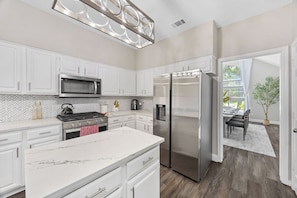 Microwave, oven, stovetop, dishwasher - The Pony Haus – Pool, Spa +Climbing Wall sleeps 11 in Frisco TX! (Frisco)