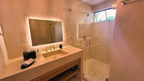 Shower, hair dryer, towels, soap