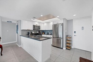Premium Condo, 2 Bedrooms, Balcony, Lagoon View | Private kitchen | Full-size fridge, microwave, oven, stovetop