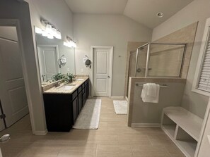 Shower, hair dryer, towels, soap - Model- Home Modern, Spacious, and Great Location (Buford)