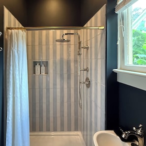 Shower, hair dryer, towels, soap