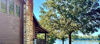 Log cabin with walkout basement and loft located on Ohio River’s edge.