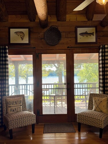 Log cabin with walkout basement and loft located on Ohio River’s edge.