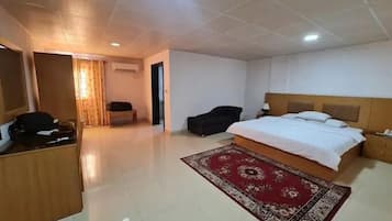 Deluxe Room, Balcony, City View | Desk, laptop workspace, free WiFi