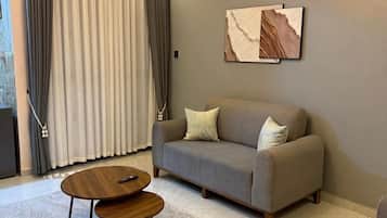 Apartamento Confort, vistas a la ciudad | Zona de estar