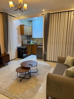 Comfort Apartment, City View | Living area