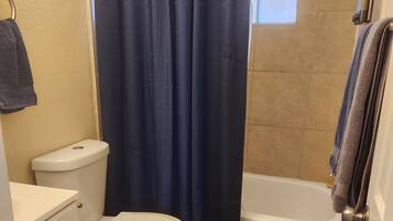 Hair dryer, towels, soap, toilet paper