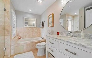 Jetted bath, hair dryer, towels, soap