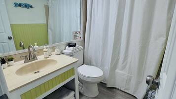 Hair dryer, towels, soap, shampoo