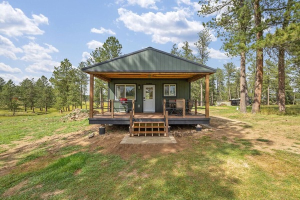 Nestled in the heart of the Black Hills, this charming getaway features a warm, inviting space with all the comforts of home.