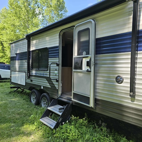 Exterior. Back road camper in New Straitsville on monday creek and by old mans cave.