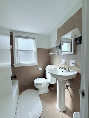 Hair dryer, towels, soap, toilet paper
